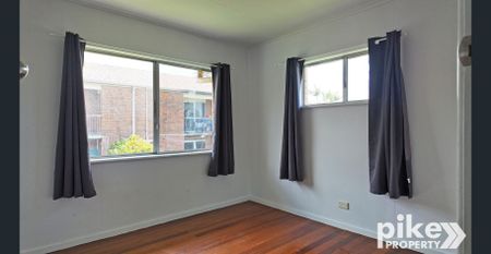 High-Set Home with Large Backyard - Photo 2