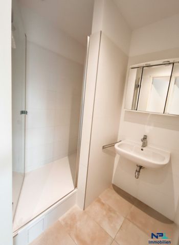 Moderne 2 Zimmer Mietwohnung mit Loggia und Garten in bester Lage - Foto 5