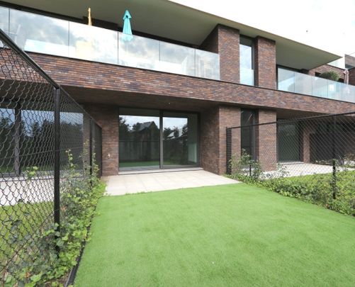 Gelijkvloers appartement met zuid gerichte tuin! - Photo 1