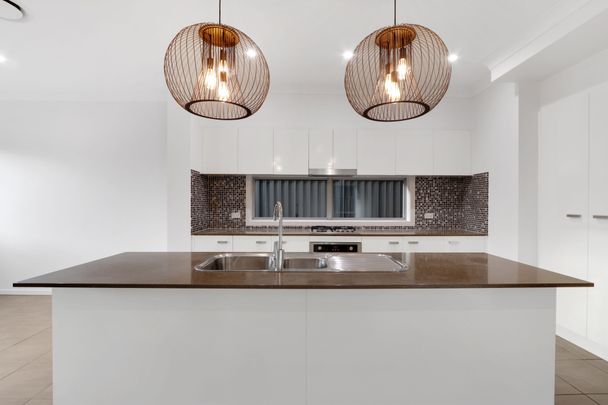 Luxurious Family Living in Middleton Grange - Immaculate 4 Bedroom Home with Premium Finishes! - Photo 1