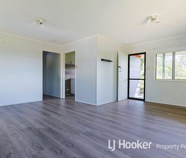 Family-Friendly Comfort with Large Backyard & Renovated Interiors - Photo 2