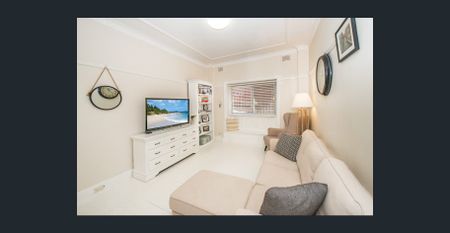 BEACHSIDE ONE BEDROOM + SUNROOM APARTMENT - Photo 2