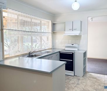 Three Bedroom Home in Sought-After Estate - Photo 6