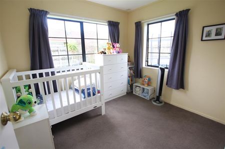 Spacious Family Home with Reserve Outlook, Large Fenced Garden & Covered Deck - Photo 2