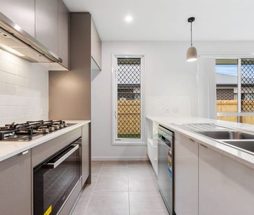 Modern 4-Bedroom Family Home in Prime Victoria Point Location! - Photo 6