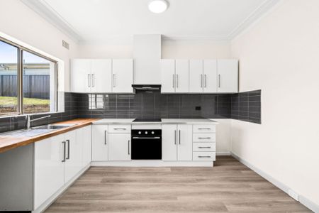 Charming Freestanding Home - Photo 4