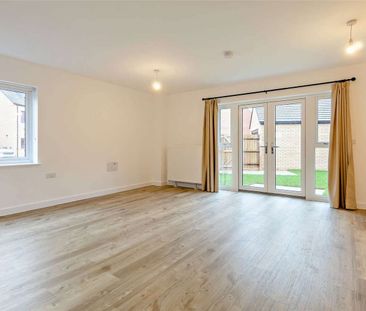 A four bedroom detached family home with a garage and garden - Photo 1