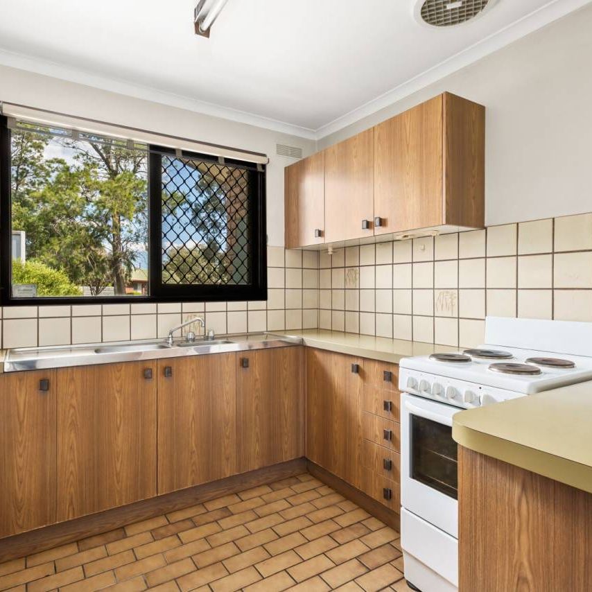 WELL PRESENTED | TWO-BEDROOM UNIT | AIR CONDITIONED - Photo 1