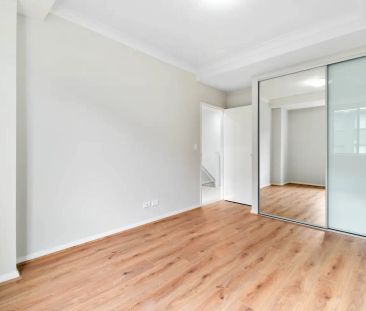 “Contemporary Comfort Meets Convenience in Prime Location!” - Photo 2