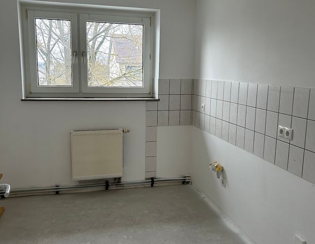 Gut geschnittene Wohnung mit Balkon - Foto 1