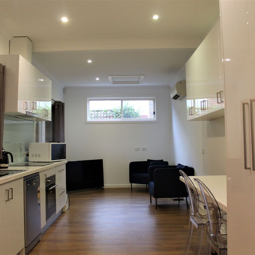 FULLY FURNISHED AND ALL UTILITIES INCLUDED - TOWNHOUSE LIVING IN GREAT LOCATION!!! - Photo 1
