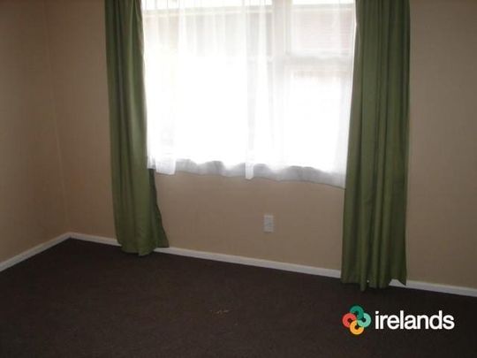 Warm Sunny Family Home - Photo 1