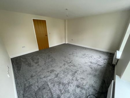 A three storey four bedroom townhouse with allocated parking and a garage in Mexborough. - Photo 4