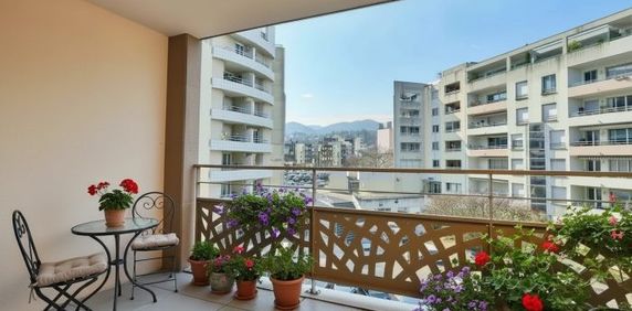 T3 RUE AMADEO BALCON ET STATIONNEMENT - Photo 2