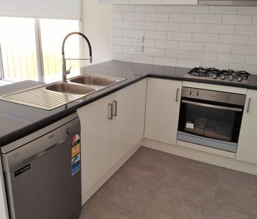 AS NEW THREE BEDROOM HOME - Photo 5