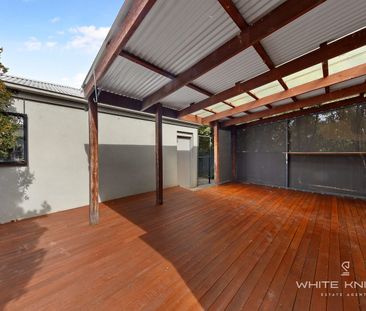 RECENTLY RENOVATED TOWNHOUSE FOR LEASE - Photo 2