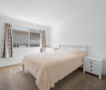 Sunny single level unit with covered deck - Photo 4