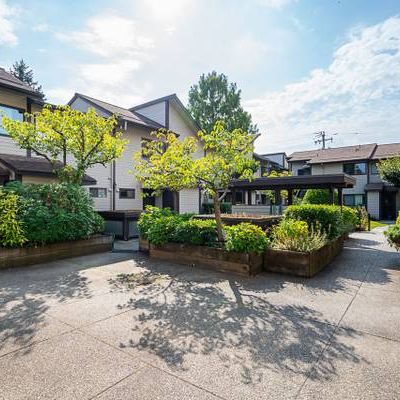 Sunlit Cambie Courtyard Townhome with Spacious Patio 460 W 16th - Photo 1