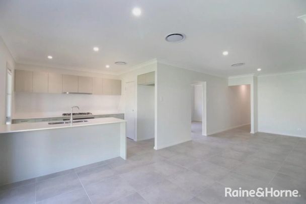 Modern Family Living in a Peaceful Estate - Photo 1