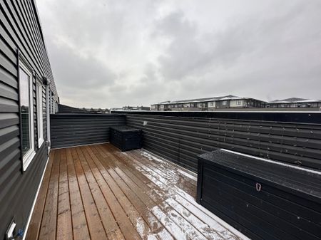 Private Rooftop Patio & Bonus Room | 2 Bed Townhouse In Vibrant Seton - Photo 4
