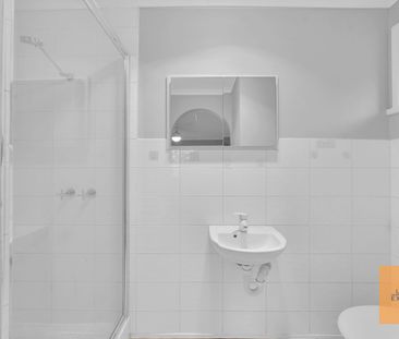 Freshly Updated Three-Bedroom Home in Convenient Location - Photo 6