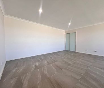 NEAR NEW 4 BEDROOM HOME - Photo 5