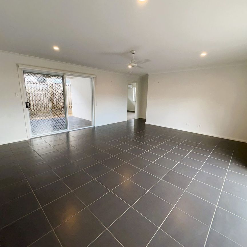 BREAK LEASE - Modern 4-Bedroom Home in Sought-After Gainsborough Greens Estate - Photo 1