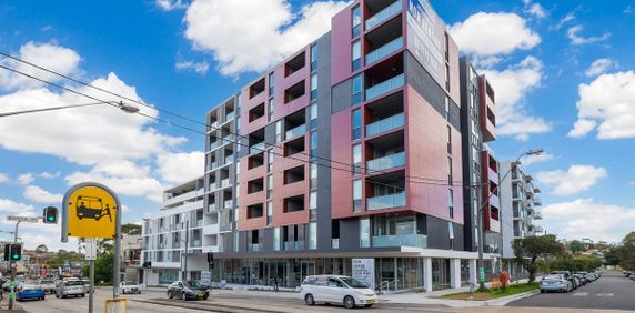 Entry via block C,1-bedroom modern apartment now for lease - Photo 2