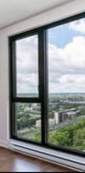 🏙️ Condo meublé 2 ch + stationnement intérieur – Centre-ville - Photo 1