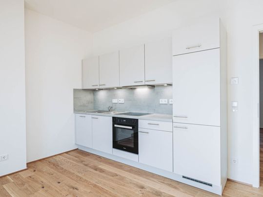 Erstklassiger Neubau: Exklusive 2-Zimmer-Wohnung mit moderner Küche - Foto 1
