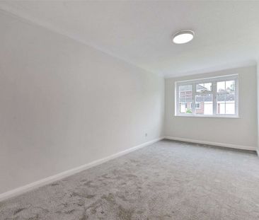 An updated four bedroom detached home located only 1.3 miles to the... - Photo 2