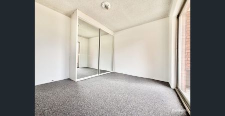 Neat & Tidy First-Floor Two Bedroom Unit... - Photo 2