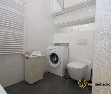 Ekskluzywny Apartament z Nowoczesnym Wnętrzem - Zdjęcie 4