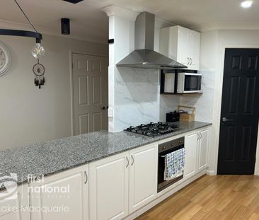 Charming and Spacious 4-Bedroom Home - Photo 1