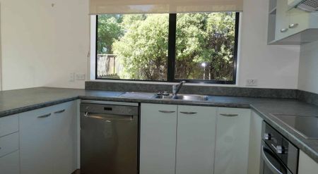 Charming Three-Bedroom Brick and Tile Home - Photo 5