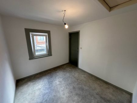 Budgetvriendelijke centrumwoning met 2 slaapkamers - Photo 3