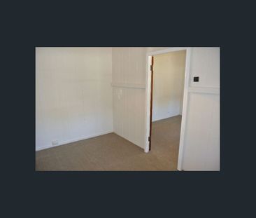 Two Bedroom Home in Central Location + Lawn Maintenance Included! - Photo 4