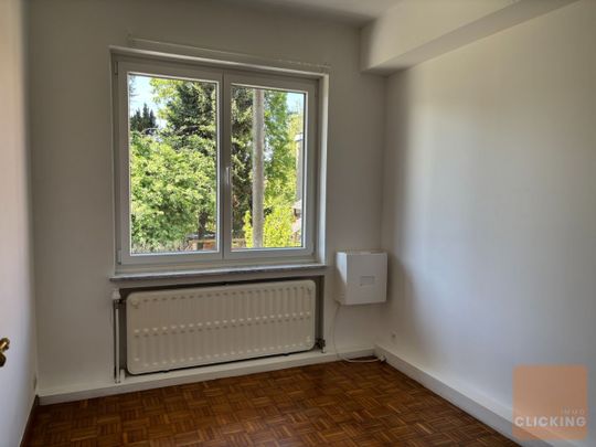 Tof 2 slaapkamer appartement met 2 parkeerplaatsen en ruime tuin - Photo 1