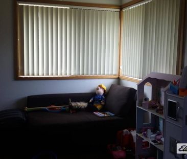 Charming 3 Bedroom Brick Home with Double Garage - Photo 2