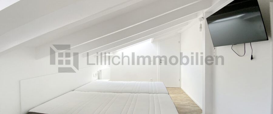 Moderne 2-Zimmer-Wohnung mit EBK und Dachterrasse in Top-Lage! - Foto 1