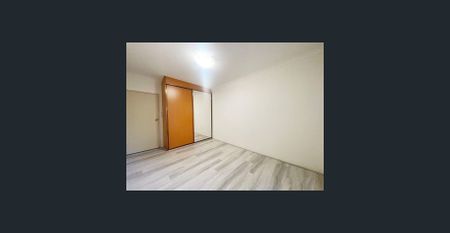 ELEVATED UNIT IN A CENTRAL LOCATION - Photo 2