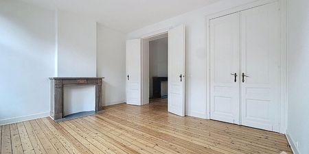 Appartement te huur in Etterbeek voor € 1.000 met 1 slaapkamer - Photo 2