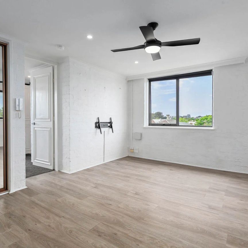 Light-Filled Top-Floor Sanctuary with Sweeping Views and Exceptional Space - Photo 1