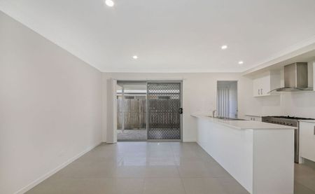 A spacious, stylish and contemporary haven that you and your family will surely love. - Photo 4