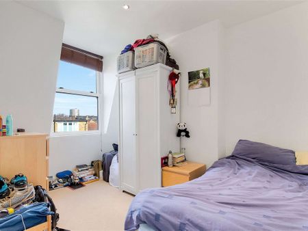 This well-proportioned three bedroom apartment is set over two floors creating a feeling of space and light. - Photo 3