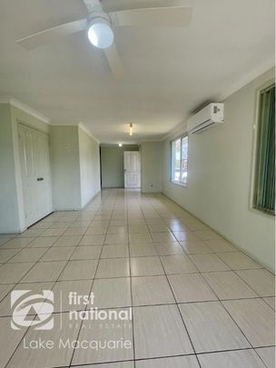 LOW MAINTENANCE LIVING WITH SPACIOUS BACKYARD - Photo 1