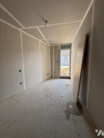 SAINT GERMAIN EN COGLES Au calme, Dans le bourg. Maison neuve de plain-pied proposant salon-séj... - Photo 2