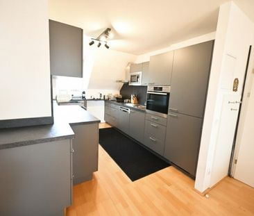 Exklusive Dachgeschosswohnung mit großer Terrasse – Ruheoase im Her... - Photo 6