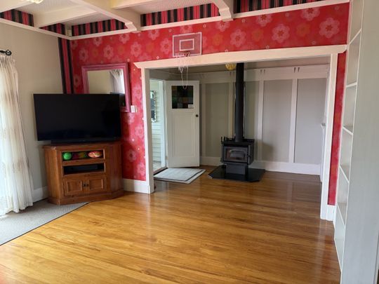 Step inside this beautifully presented 1930s three-bedroom, one-bathroom home, full of character and warmth. - Photo 1