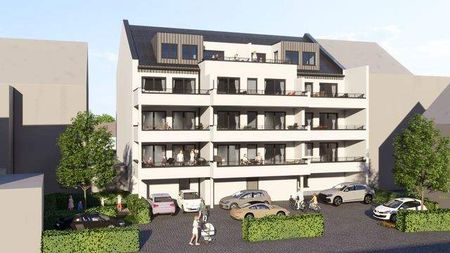 Ahlener Marienplatz, eine 2-Zimmer Neubauwohnung mit 65m² Wohnfläche im EH 40 KNG-Haus. - Photo 2